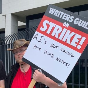 Protest sign at the WGA Strike against usage of AI in hollywood